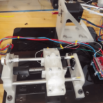 Use an Arduino and a pair of stepper motors to automatically wind pickups