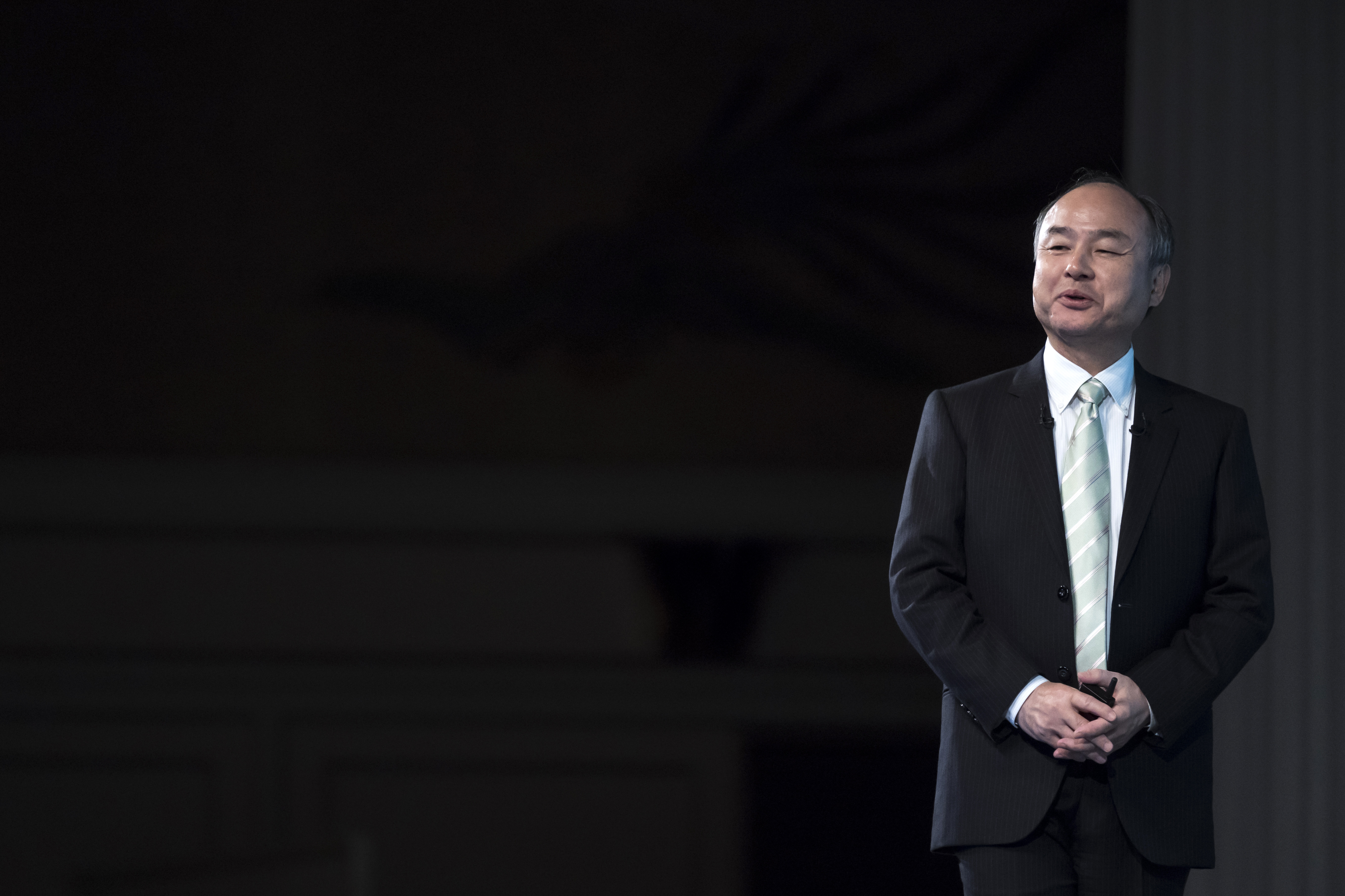 TOKYO, JAPAN - FEBRUARY 12: SoftBank Group Corp. TOKYO, JAPAN - FEBRUARY 12: SoftBank Group Corp. Chairman and Chief Executive Officer Masayoshi Son speaks during a press conference on February 12, 2020 in Tokyo, Japan. SoftBank reported its third-quarter earnings results today following the approval of a merger between T-Mobile US Inc. and SoftBank's U.S. telecom unit Sprint Corp. from a federal judge. (Photo by Tomohiro Ohsumi/Getty Images)