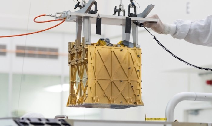 MOXIE being lowered into the rover