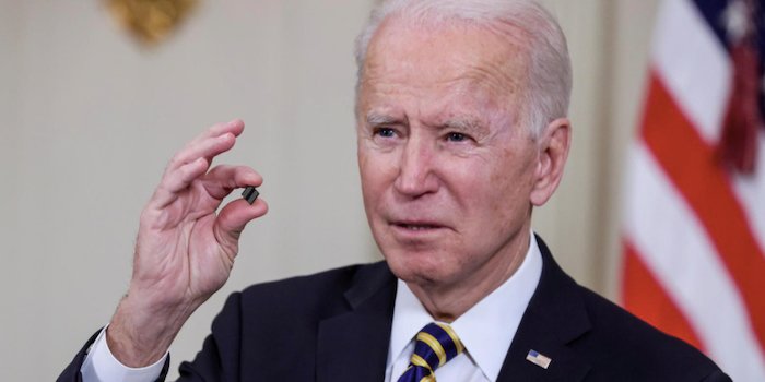 Hyperedge- , PCB Design, Hardware Design, Electronics Design, President Biden during the press conference holding a microchip