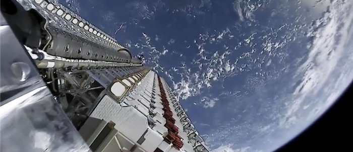 More than 60 Starlink satellites orbiting earth before deployment.