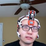 This futuristic-looking device actively discourages you from touching your face