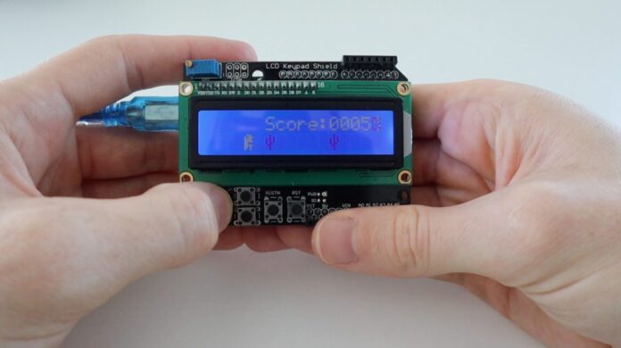 Arduino plays the Chrome Dinosaur Game on another Arduino