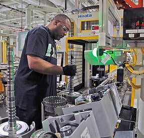 Hyperedge- , PCB Design, Hardware Design, Electronics Design, Man working in a manufacture.