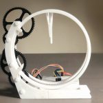Holo Clock is a novel 3D-printed clock that tells time using a pair of rings