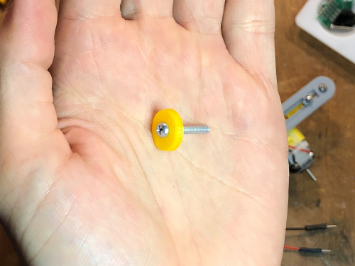Plastic washer threaded onto 4-40 screw