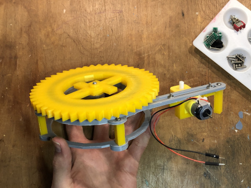 Top side of bearing secured to base