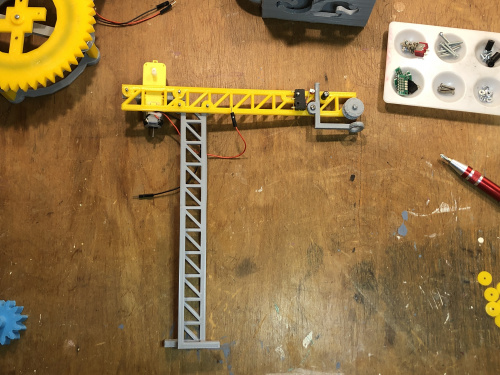 Crane boom attached to mast