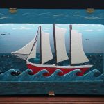 This automated diorama shows a boat sailing through a storm