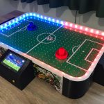 This homemade table puts a soccer spin on air hockey