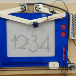Sketch the current time with this Magna Doodle clock