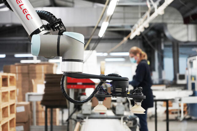Hyperedge- , PCB Design, Hardware Design, Electronics Design, Women working in collaboration with a robot in a manufacture