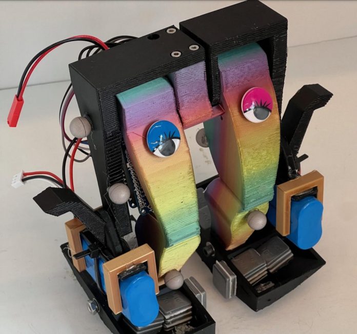 Bipedal robot walks with a single motor