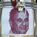 This machine automatically threads beautiful string art