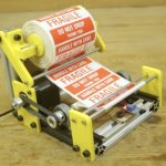 This simple machine quickly dispenses labels