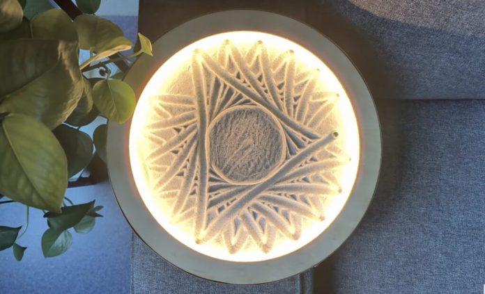 This beautiful table creates art in the sand