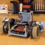 This platypus-shaped robot is built from vacuum cleaner parts