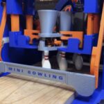 A tabletop bowling lane machine you can 3D print at home